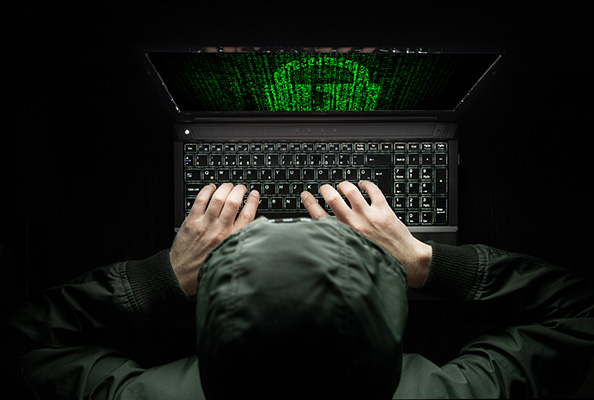 Hacker on laptop