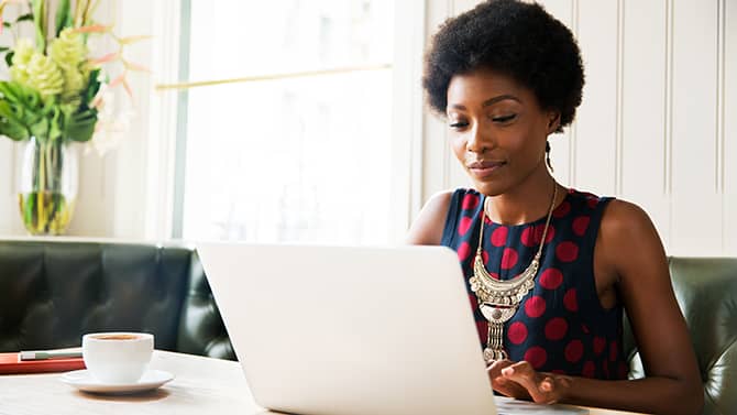 A woman using a password manager