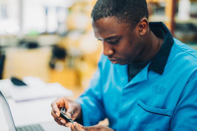 A man holding a crypto wallet